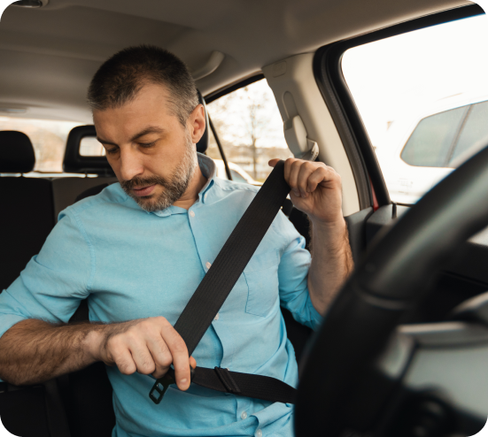 Driver checking navigation in car